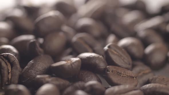 Fresh coffee beans background detailed macro panning shot alt