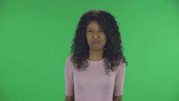 Portrait of Beautiful African American Young of Annoyed Woman Gesturing in Stress Expressing alt