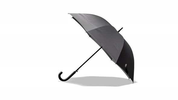 Blank black open umbrella lying, looped rotation alt