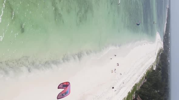 Vertical Video Boats in the Ocean Near the Coast of Zanzibar Tanzania Aerial View alt