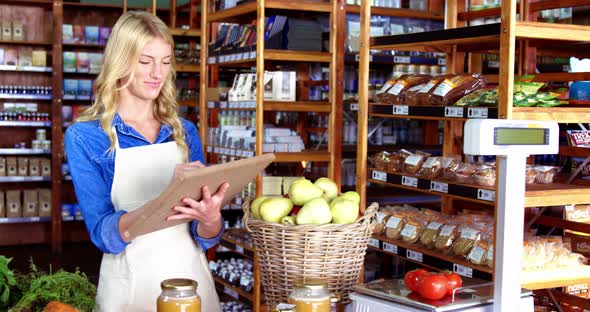 Female staff writing on slate alt