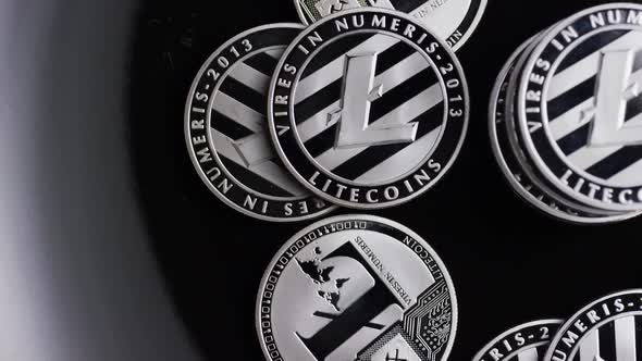 Rotating shot of Bitcoins (digital cryptocurrency) - BITCOIN LITECOIN 366 alt