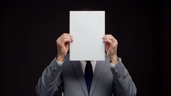 Studio portrait of successful and smart businessman in suit and tie. alt
