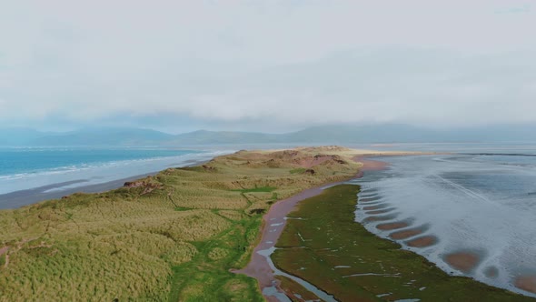 Flight Over Dunes at the Atlantic Coast in Ireland alt