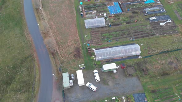 Small Scale Greenhouse City Farm Urban Agriculture Top Down Aerial Circling