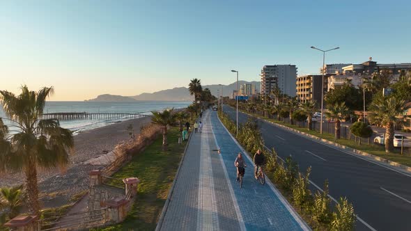 People walk around the embankment alt