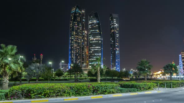 Skyscrapers of Abu Dhabi at Night with Etihad Towers Buildings Timelapse Hyperlapse alt