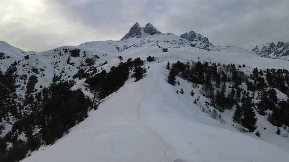 Drone aerial view on Mount Ushba. Mestia village, caucasus, Georgia.Sunset and snow. alt