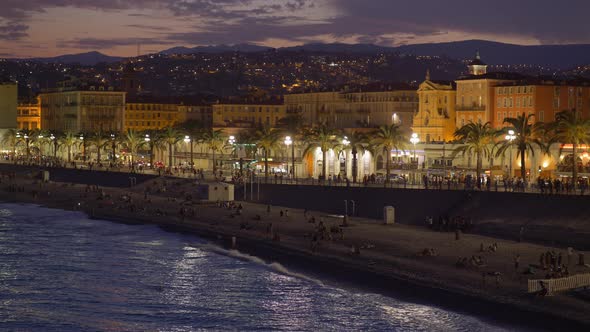 Evening View of the Beach and Embankment of Nice, France, Panning Shot alt