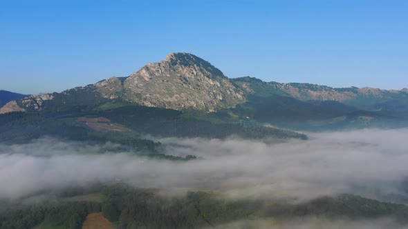 Aerial View of the Mountain and Morning Fog in the Suburb of Durango Basque Country alt