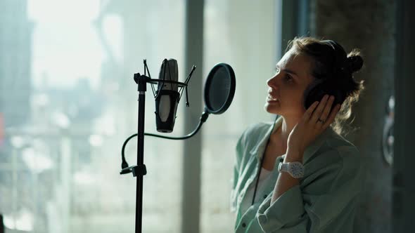 The Announcer Records an Advertising Text at a Recording Studio