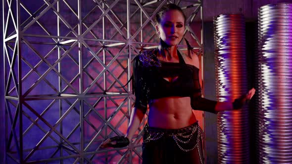 Adult Sexy Woman is Dancing Alone in Studio Moving Hands and Chest Medium Shot alt