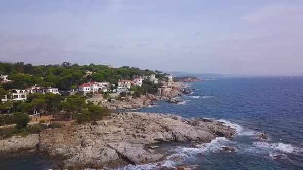 Spain Costa Brava Mediterranean coastline aerial view from the sea shore, Canyelles Grosses, Roses, alt