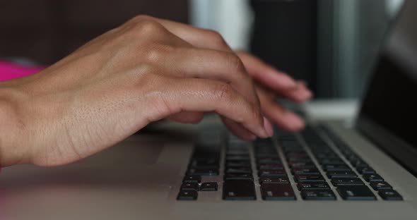 Female hands of business woman professional user worker using typing on laptop.