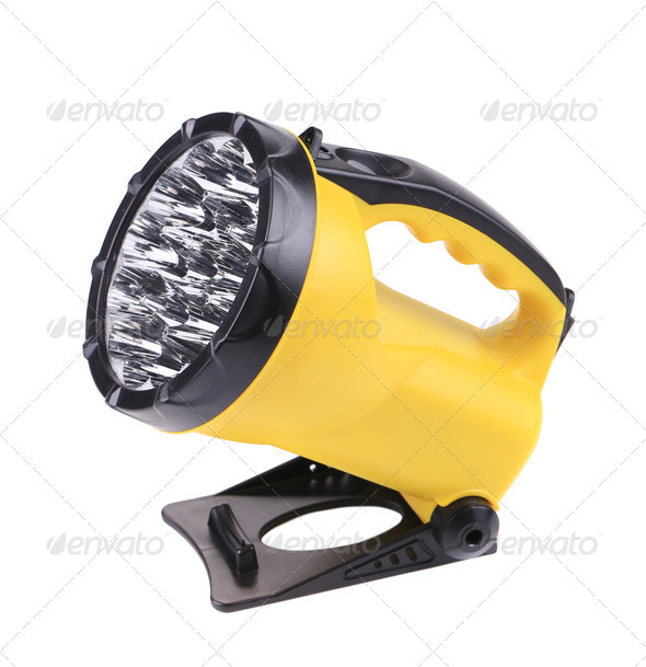 Yellow plastic pocket handle flashlight.