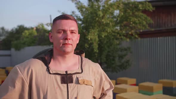 Portrait of a Young Owner of an Apiary on Which He Breeds Bees and Extracts Honey