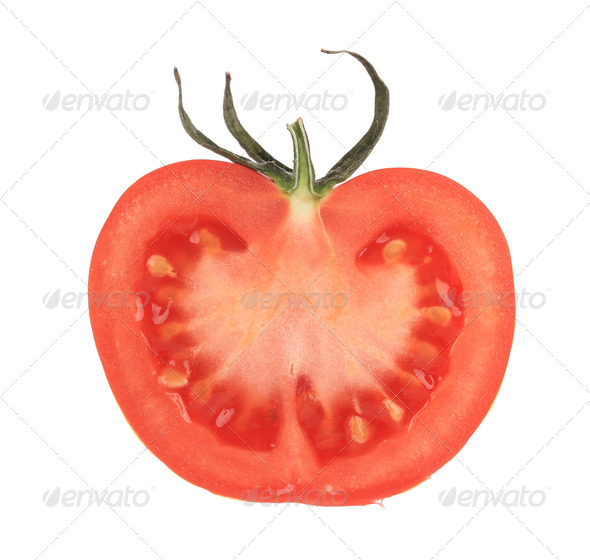 Cut half tomato. Stock Photo by indigolotos PhotoDune