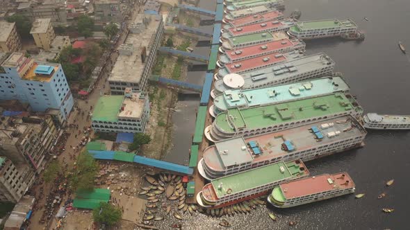 Aerial view of a busy wharf along Buriganga river, Bangladesh. alt