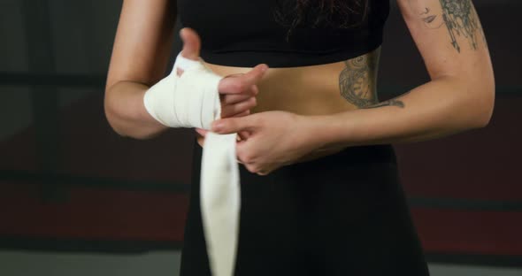 Boxer Woman Wear White Wristbands 10B