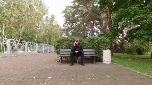 Happy Man Calling On The Phone alt