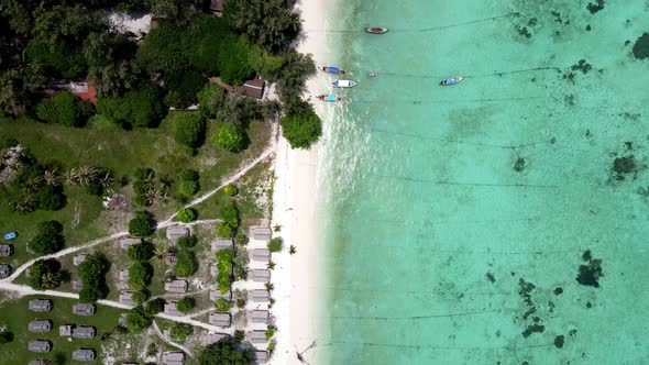 Small local asian housing in tropical beach of Thailand island. Top down view alt