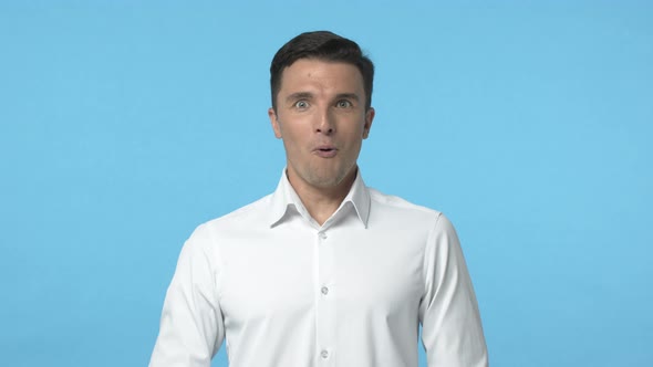 Slowmotion Impressed Excited Handsome Adult Guy in White Tshirt Gasping Wondered Say Wow Stare alt