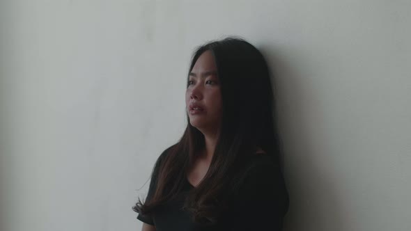 Asian Young Woman Sad And Depressed alt