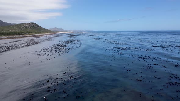 Aerial view of Atlantic Ocean Misty Cliffs coastline, Cape Town, South Africa. alt