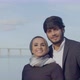 Beautiful Arabic Couple Standing in Background of Blue Sky - VideoHive Item for Sale