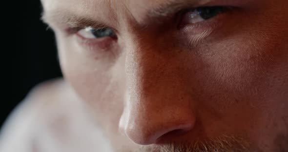 Angry Man Looking at Camera and Frowning alt