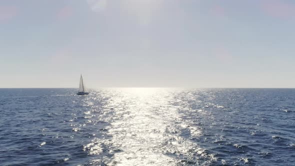 Sailboat Sailing in Daytime in the Eastern Seas of Spain alt