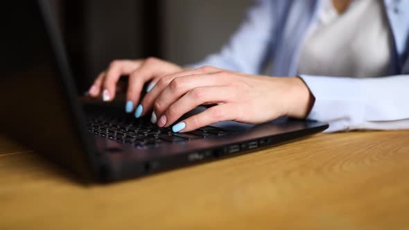 Slow motion Unrecognizable Businesswoman female hands using typing on laptop alt