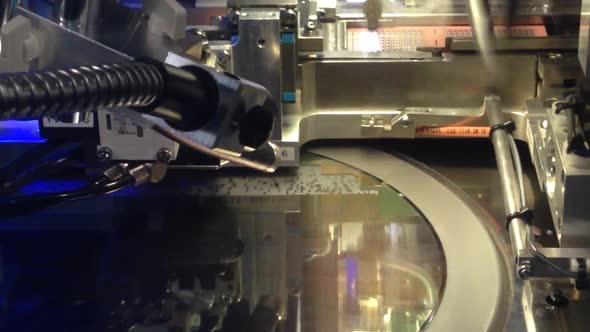 Pick up silicon die wafer in semiconductor manufacturing, Motion video of pickup silicon wafer. alt