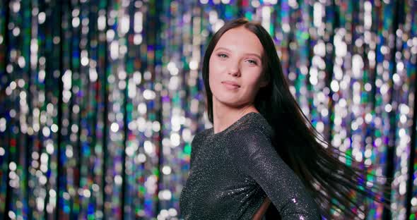 Close Up Portrait of Sensitive Woman is Turn Around at Camera and Smiles She Has Dark Long Hair and alt