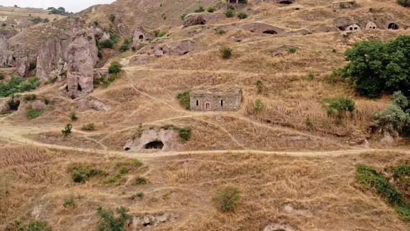 Aerial Drone Zoom Out Khndzoresk, Cave City, in Armenia