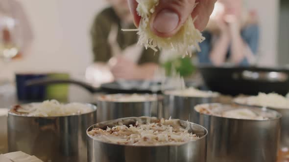 Spreading Some Cheese On Lasagna alt