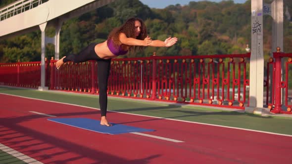 Girl Doing Asana at Sunset alt