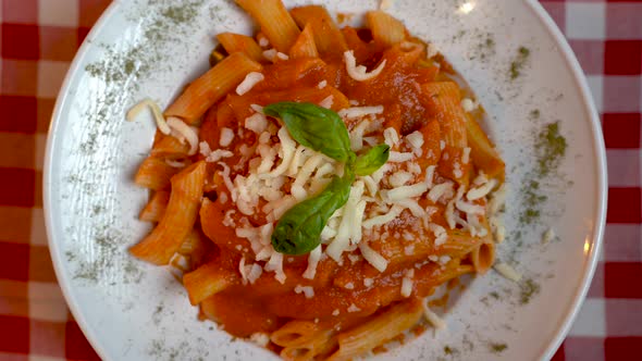 4K Top Of Bolognese Pasta with basil alt