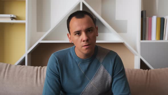 Angry Young Man Looking at Camera. People Sincere Emotions Lifestyle Concept alt