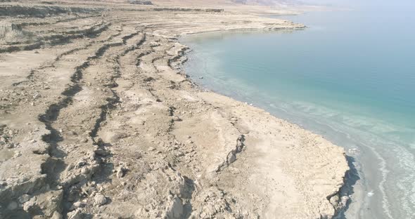 Aerial view of colourful sinkholes. The Dead sea, Negev, Israel. alt