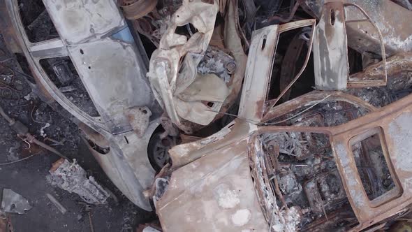 Vertical Video of a Dump of Wardestroyed Cars in Ukraine alt