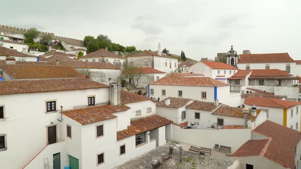 Cloudy Day with Beautiful and Ancient Houses in Castle of Óbidos