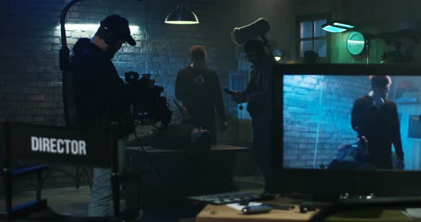 Director Using His Light Meter on a Film Set alt