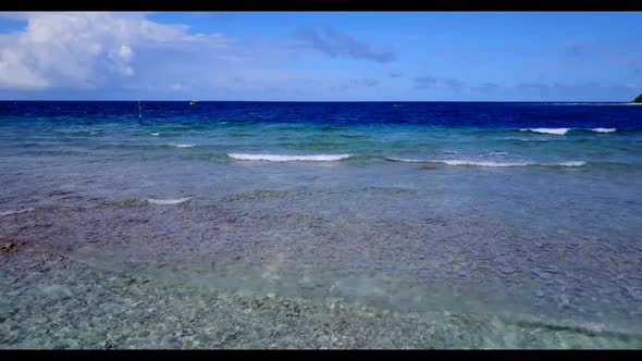 Aerial drone shot abstract of tranquil resort beach break by blue sea and white sand background of a alt