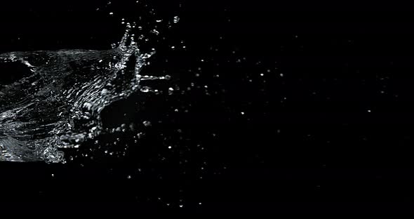 900389 Water spurting out against Black Background, Slow motion 4K alt