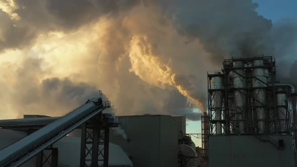 Smoke Billows From the Pipes of an Industrial Enterprise