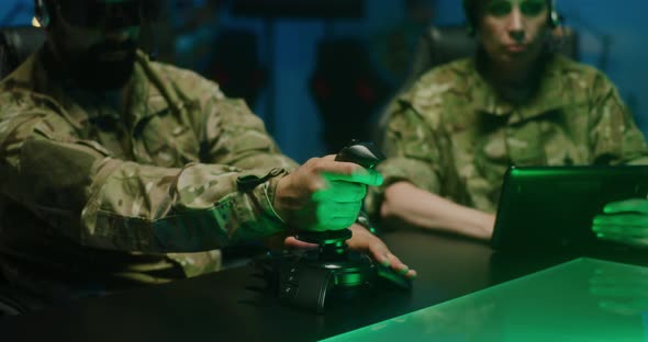 Soldier Using Remote Controlling Device alt