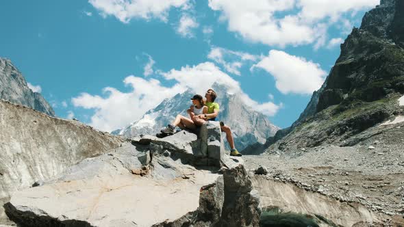Man Hugs a Woman on a March in Love  alt