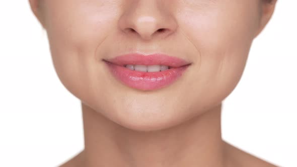 Extreme Closeup Portrait of Young Woman Wearing Light Fresh Lip Makeup Smiling Showing Her Healthy alt