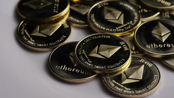 Rotating shot of Ethereum Bitcoins (digital cryptocurrency) - BITCOIN ETHEREUM 0092 alt